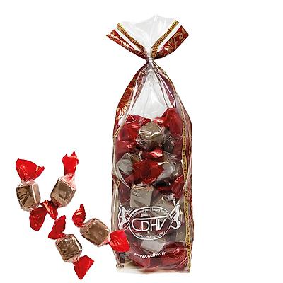 Nougat tendre aux amandes enrobé de chocolat lait à l'orange 180 g